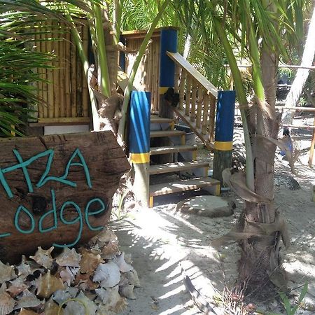 Itza Resort Long Caye Esterno foto